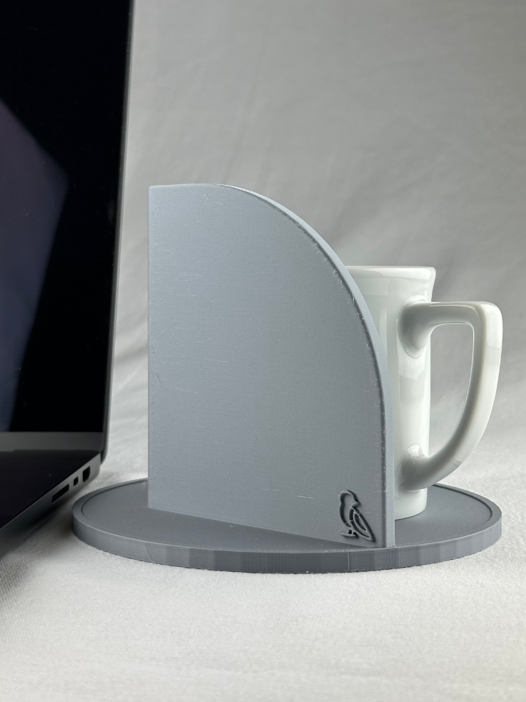 Gray CupCorner with a white mug and laptop on a light gray background